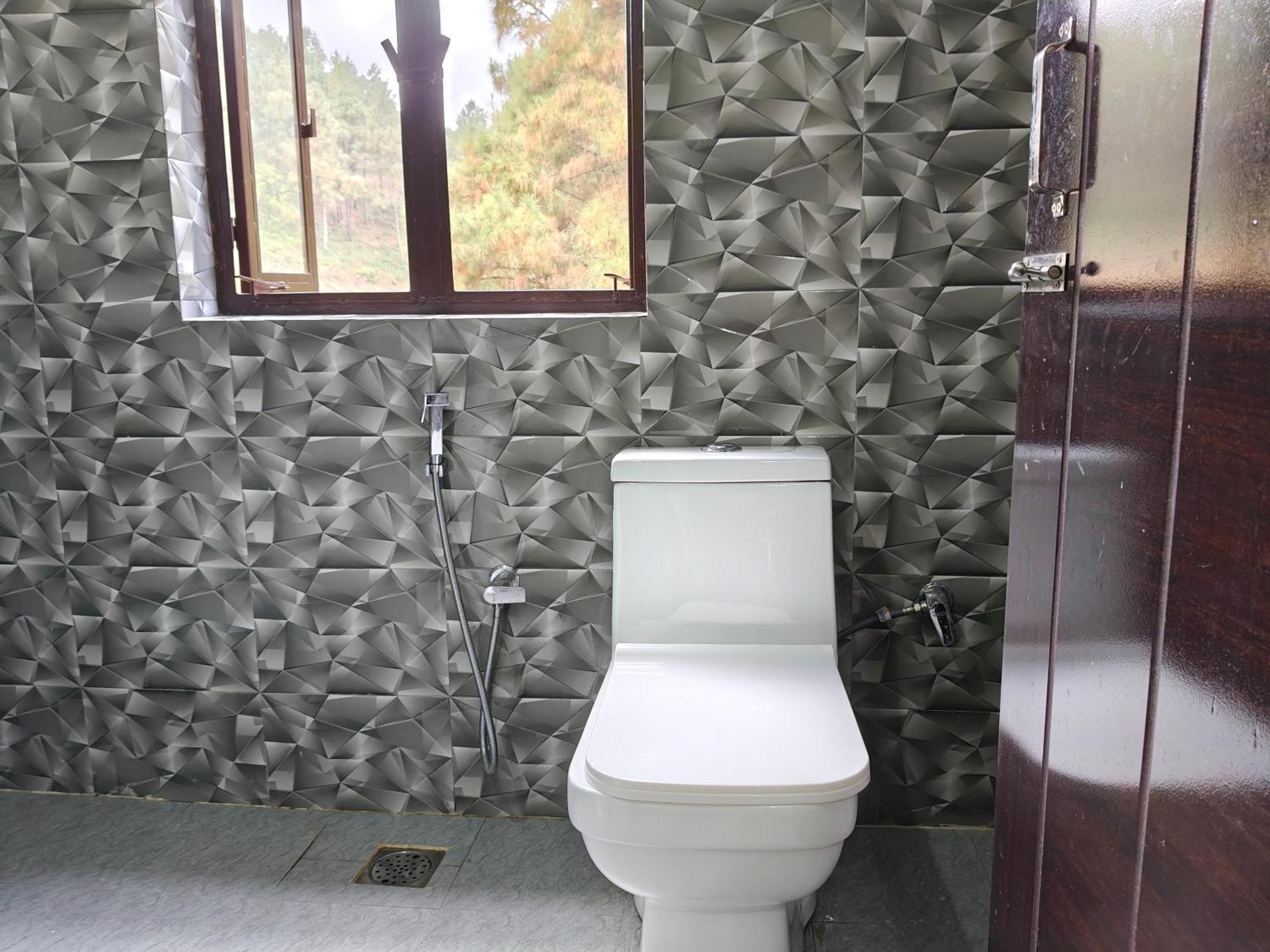 Xtsy Travellers Hostel シロン 部屋 写真